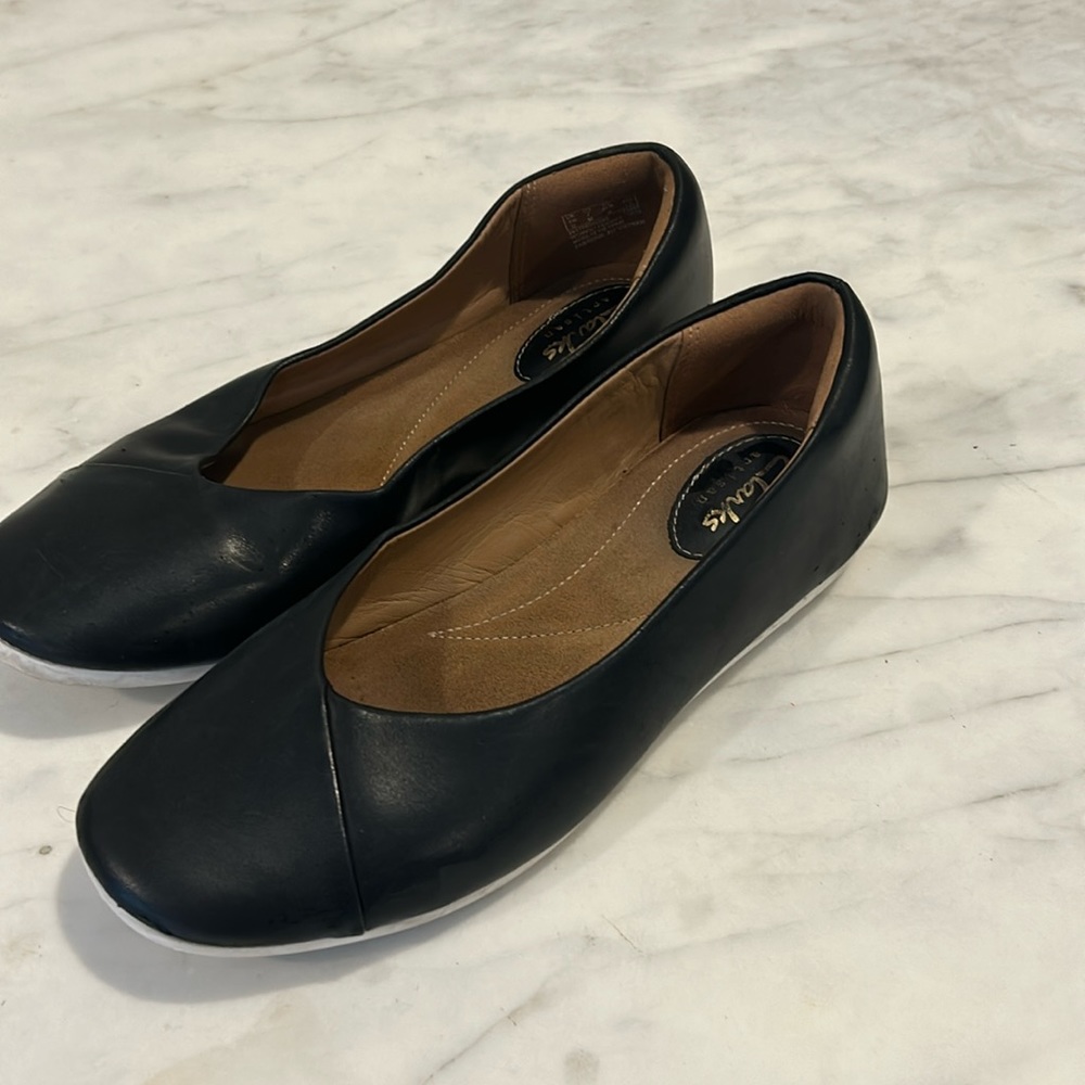 Black leather clarks flats